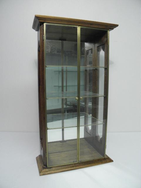 Small four tier wall curio by StudioCraft.