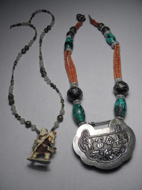 Two Chinese necklaces or amulets  1691f5