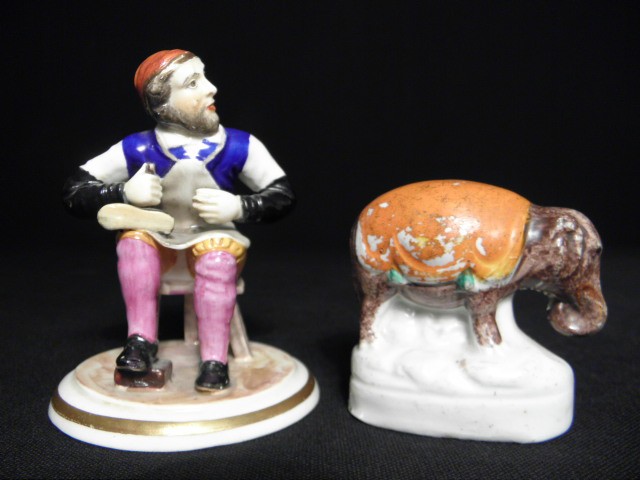 Two Staffordshire porcelain figurines.