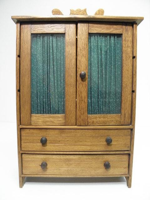 Antique wooden miniature wardrobe cabinet.