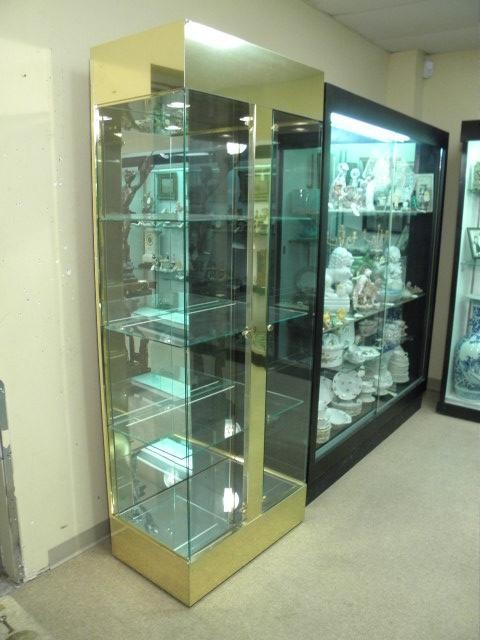 Brass and glass double door display