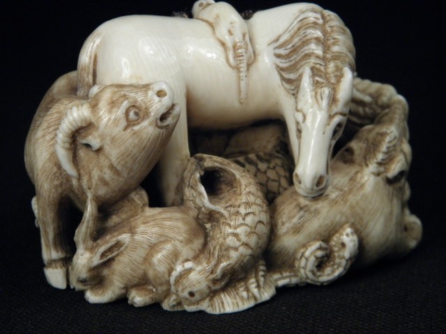 A carved ivory Zodiac animal group  169222