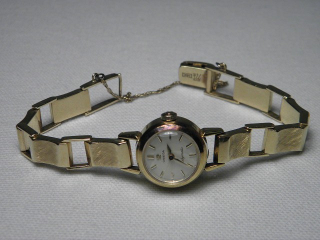 Omega 14kt yellow gold Ladymatic 169252