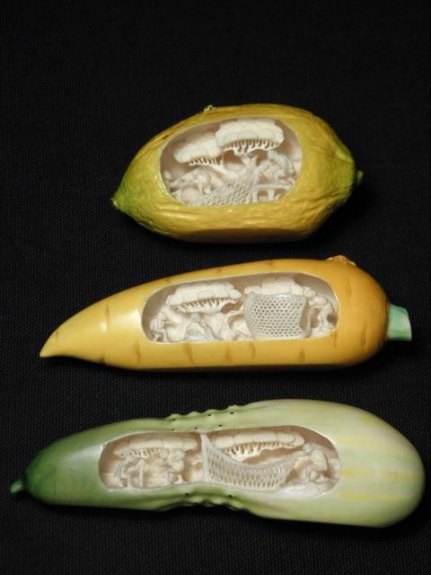 Three carved ivory polychrome vegetables