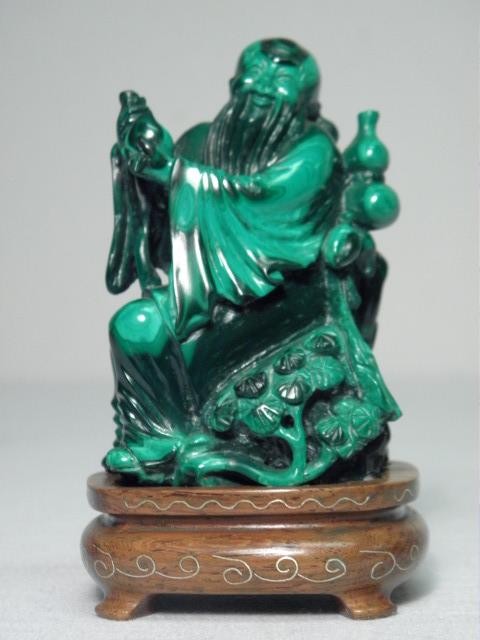 Chinese carving in green Malachite.