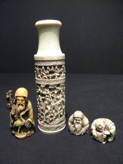 Lot of five Chinese carved resin decoratives.