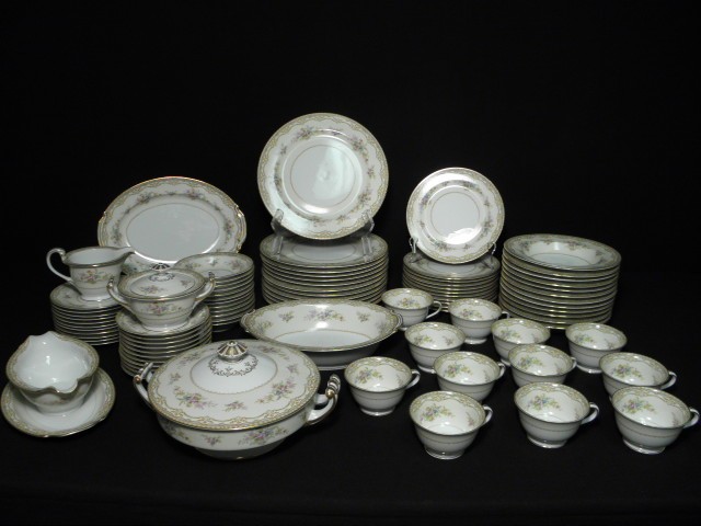 Noritake porcelain dinnerware set. Includes