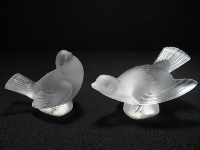 Pair of Lalique crystal bird figurines.