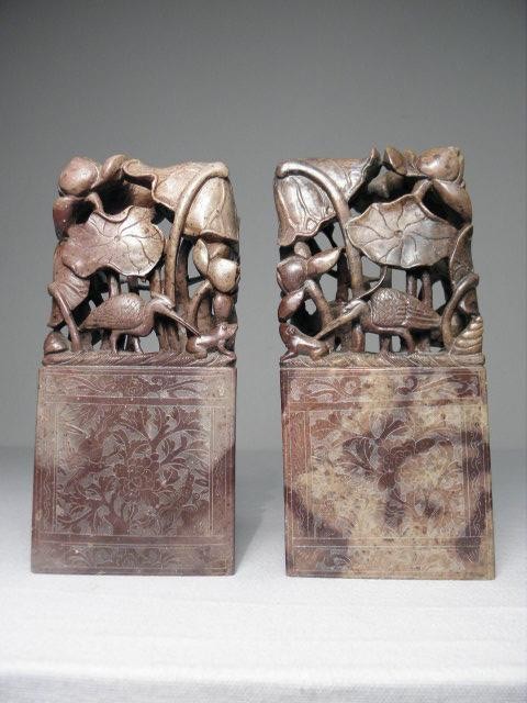 Pair of Chinese carved stone reticulated