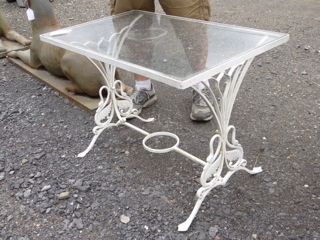 Glass top patio table with goose 1671c7
