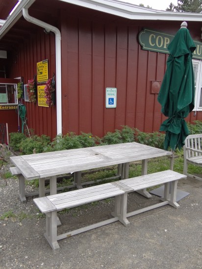 Teak patio table with two matching