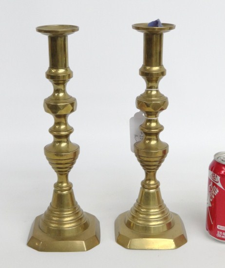 Pair brass pushup candlesticks.