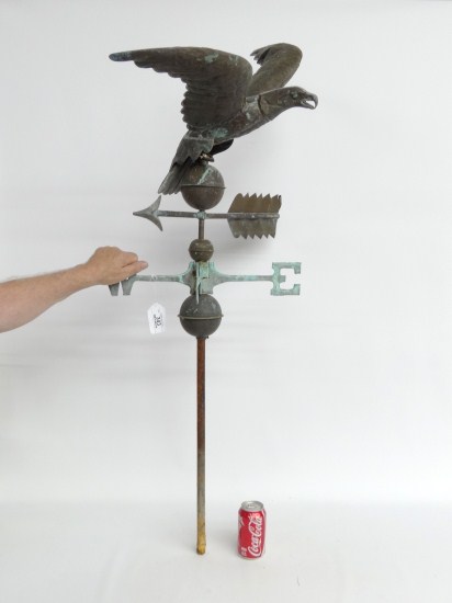 Eagle on ball weathervane with directionals.