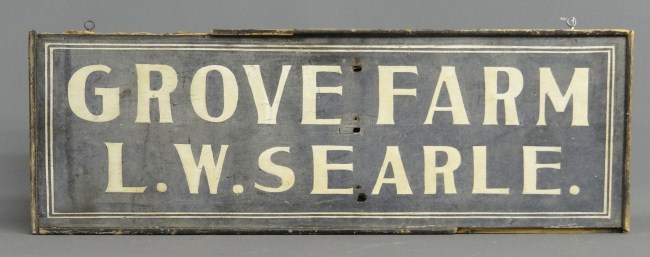 Early trade sign Grove Farm L.W. Searle.