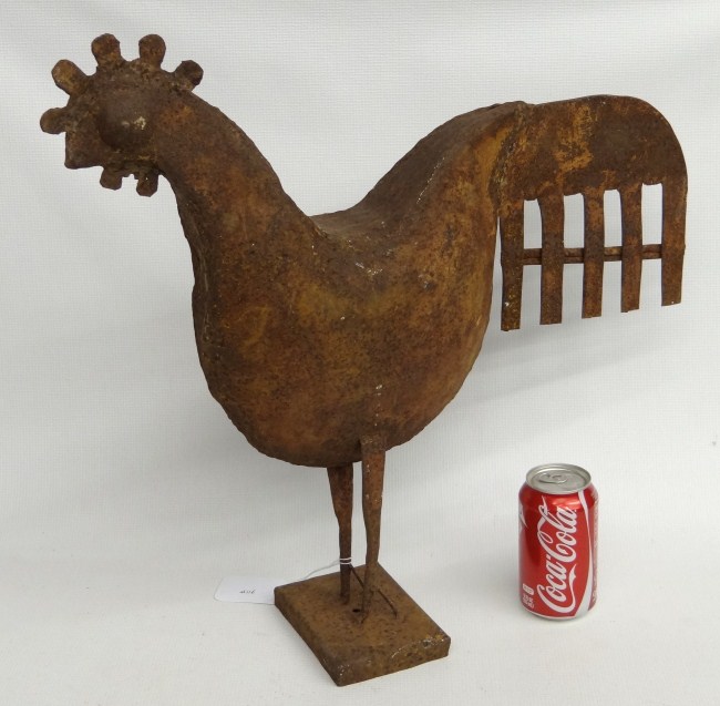 Folk art sheet iron rooster sculpture.