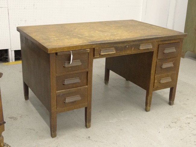 C. 1920 s oak flat top desk. 56 1/2