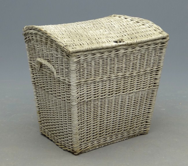 Early lidded wicker chest in old white