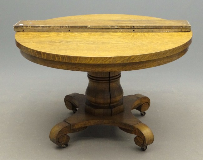 19th c. round oak dining table