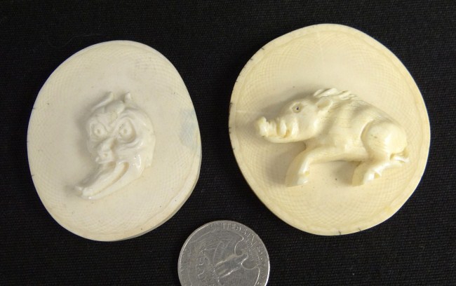 Pair Asian ivory carved discs.