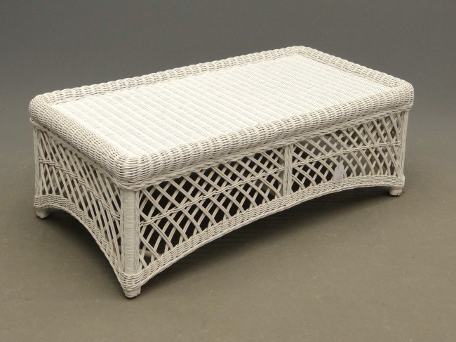 Wicker coffee table in white paint.