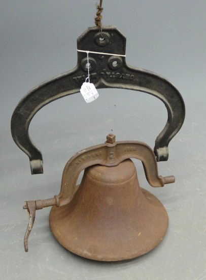 Early cast iron bell. Marked The U.S.