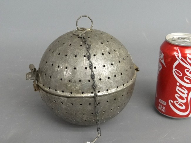 Scarce antique tin rice ball.
