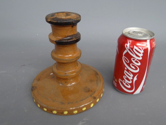 Redware candlestick. 6 1/2'' Ht.