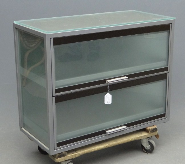 Modern glass and metal cabinet.