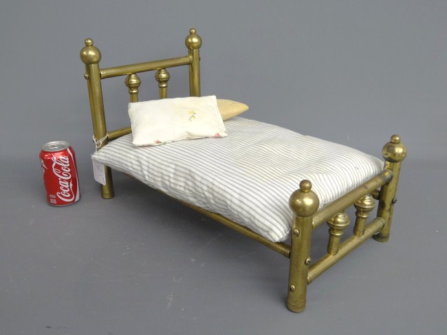 Vintage brass doll bed. Approx. 20