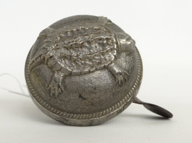 Turtle cast bell.