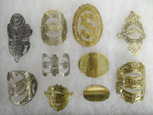 (10) head badges.