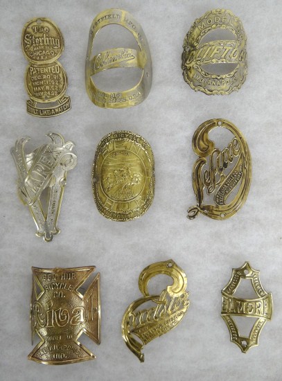 (9) head badges.