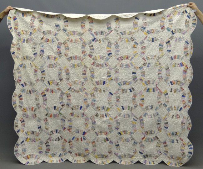 C. 1930' s Wedding Ring quilt.