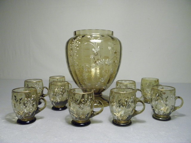 Enameled amber art glass cups and