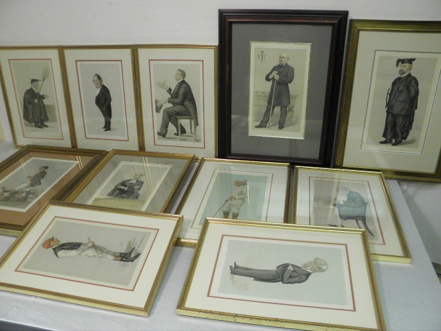 Eleven framed Vanity Fair prints