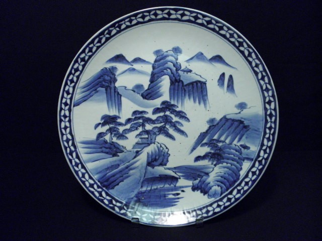 Large Arita blue and white charger.