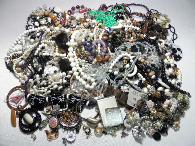 Assorted ladies costume jewelry.