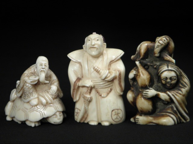 Japanese ivory netsuke group Includes 16b4a8