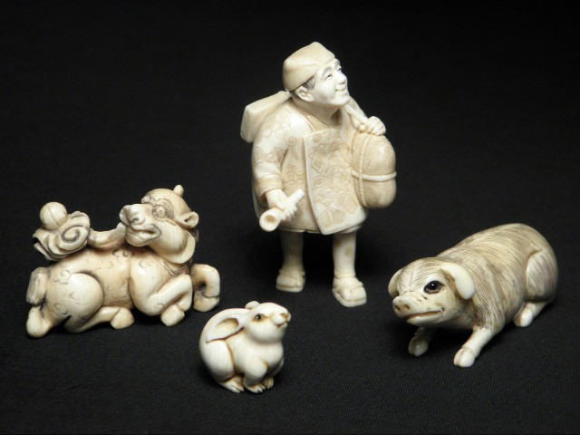 Four Japanese carved ivory netsukes  16b4aa