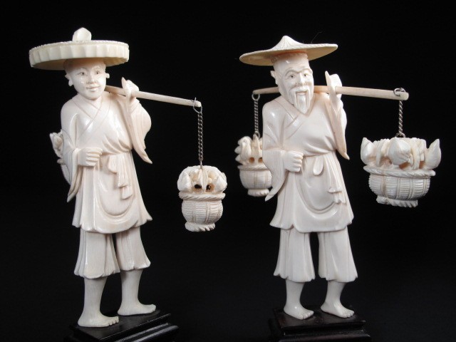 Pair of Chinese carved ivory fishermen