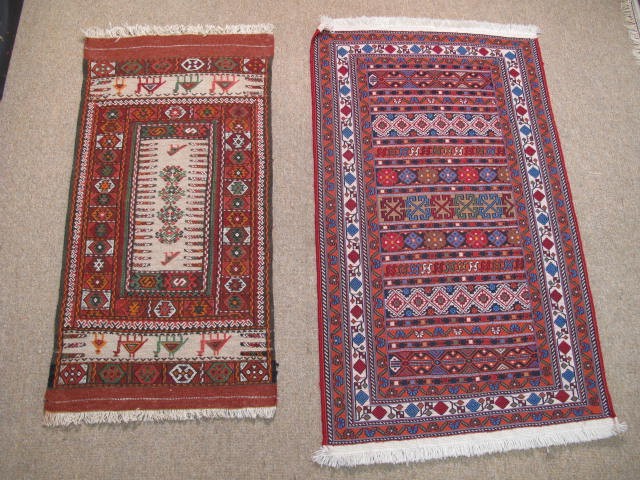 Two Persian woven wool rugs with