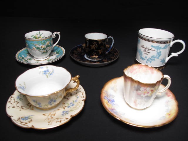 Assorted porcelain china cups and saucers.