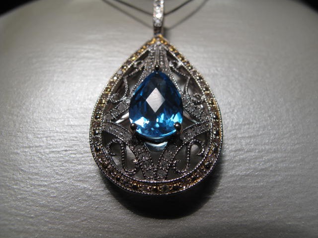 A 14kt white gold diamond and blue 16ba4f