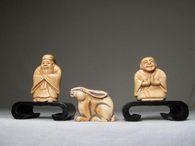 Three carved ivory netsuke Two 16ba8a