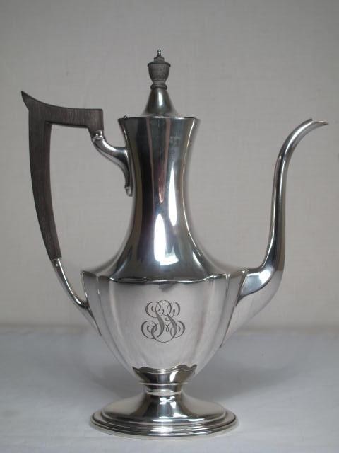 A sterling silver demitasse coffee