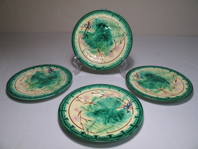 Four Majolica pottery plates in 16babf