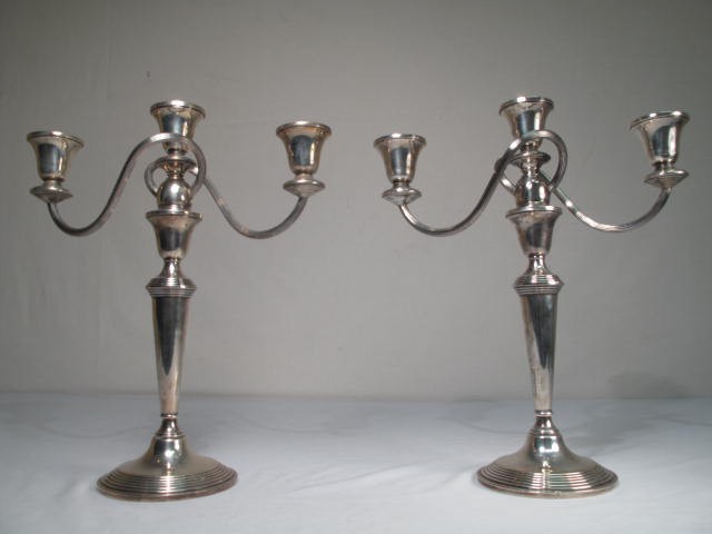 Pair of Sterling silver candelabras.