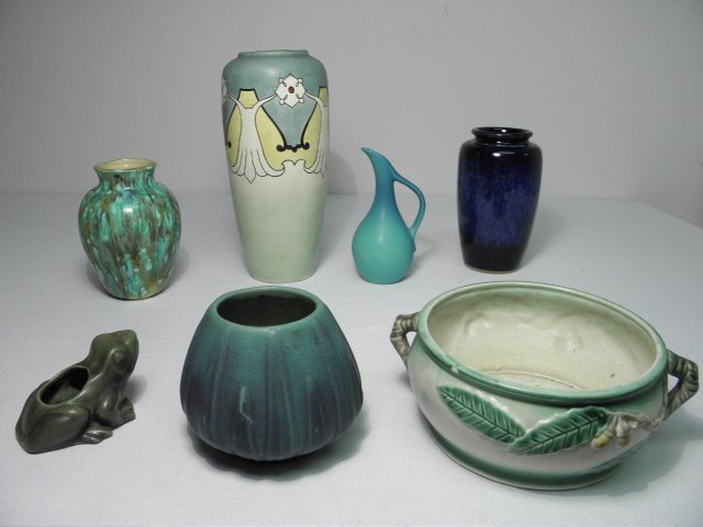 Seven pieces of assorted art pottery.