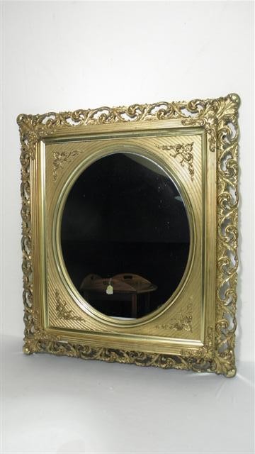 Gold gilt wall mirror with ornate