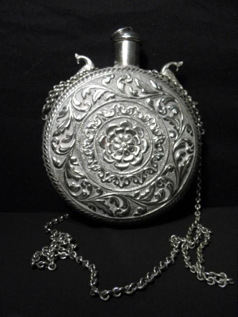 Sterling silver drinking canteen.